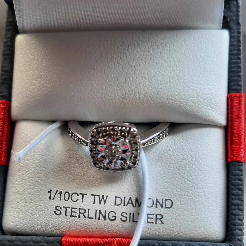 1/10CT TW Diamond Ring